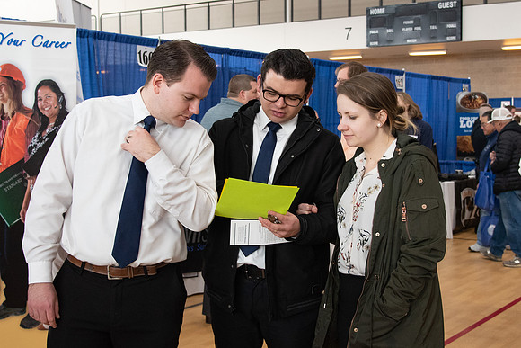 Students meet with different businesses for potential internships and jobs at a career fair at BYU-Idaho.