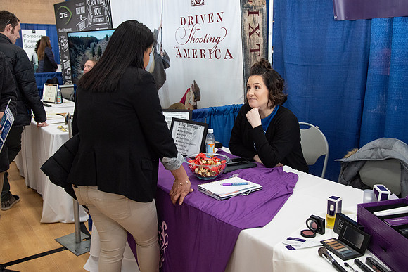 Students meet with different businesses for potential internships and jobs at a career fair at BYU-Idaho.