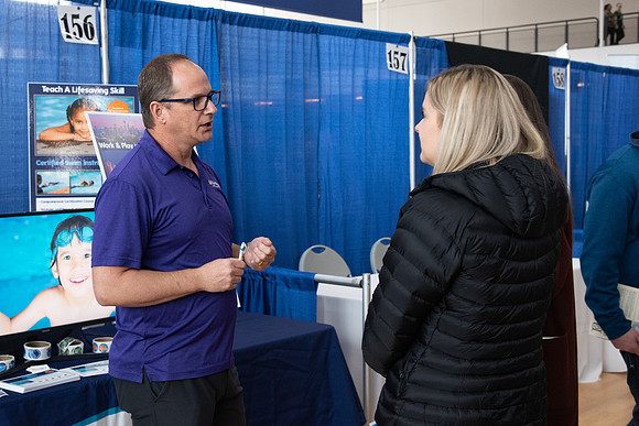 Students meet with different businesses for potential internships and jobs at a career fair at BYU-Idaho.