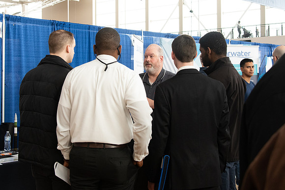 Students meet with different businesses for potential internships and jobs at a career fair at BYU-Idaho.