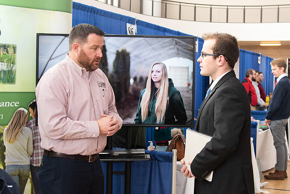 Students meet with different businesses for potential internships and jobs at a career fair at BYU-Idaho.