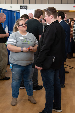 Students meet with different businesses for potential internships and jobs at a career fair at BYU-Idaho.