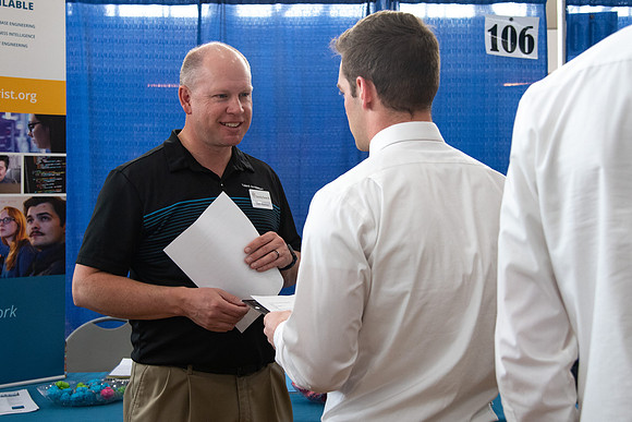 Students meet with different businesses for potential internships and jobs at a career fair at BYU-Idaho.