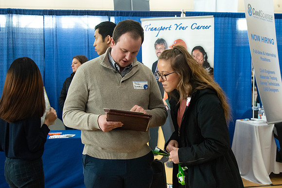 Students meet with different businesses for potential internships and jobs at a career fair at BYU-Idaho.