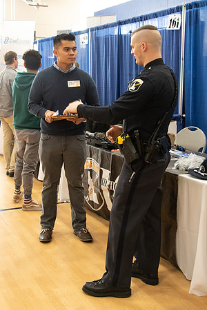 Students meet with different businesses for potential internships and jobs at a career fair at BYU-Idaho.