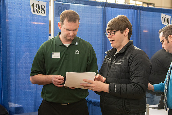Students meet with different businesses for potential internships and jobs at a career fair at BYU-Idaho.
