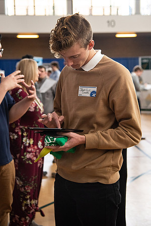 Students meet with different businesses for potential internships and jobs at a career fair at BYU-Idaho.