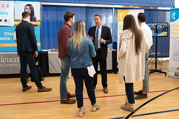 Students meet with different businesses for potential internships and jobs at a career fair at BYU-Idaho.