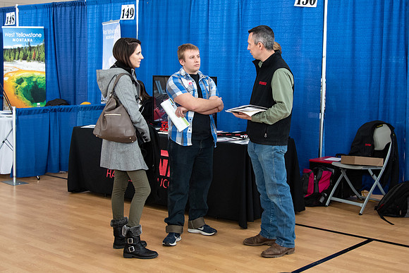 Students meet with different businesses for potential internships and jobs at a career fair at BYU-Idaho.
