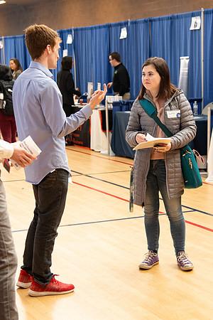 Students meet with different businesses for potential internships and jobs at a career fair at BYU-Idaho.