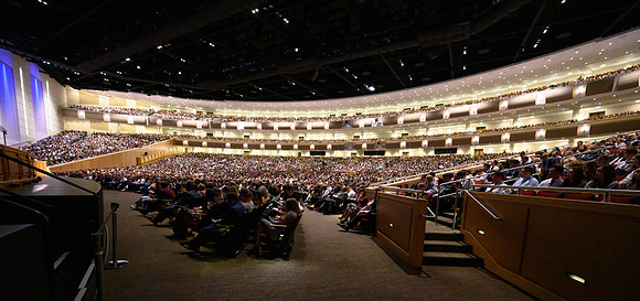 BYU-Idaho Center is completely full of students for a special devotional with Elder and Sister Uchtdorf.