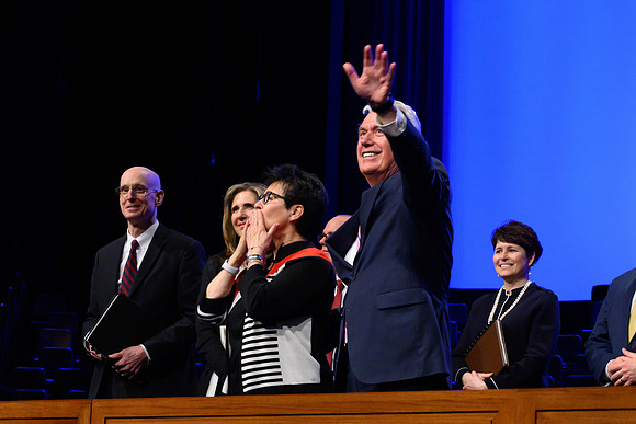 Elder and Sister Uchtdorf salute thousands of students as they leave a special devotional at the BYU-Idaho Center.