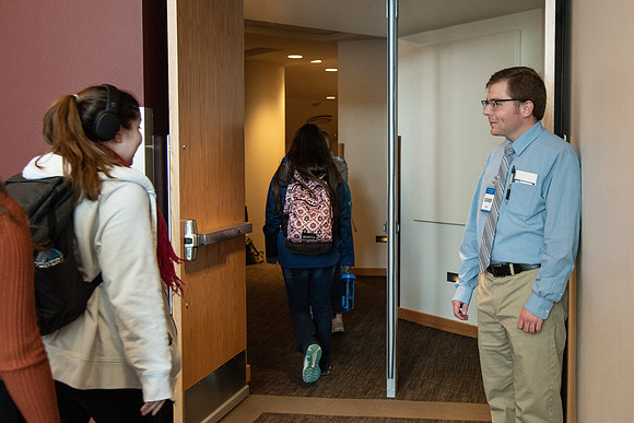 BYU-Idaho Devotional Usher welcoming the students. Winter Semester