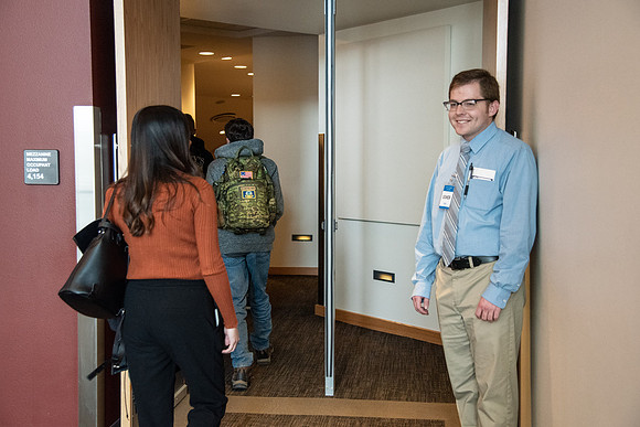 BYU-Idaho Devotional Usher welcoming the students. Winter Semester