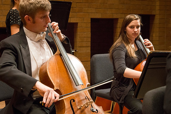 Students in the University Orchestra  during a dress rehearsal in preperation before their end of the semester concert.