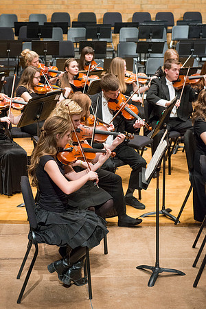 Students in the University Orchestra  during a dress rehearsal in preperation before their end of the semester concert.