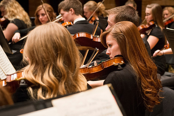 Students in the University Orchestra  during a dress rehearsal in preperation before their end of the semester concert.
