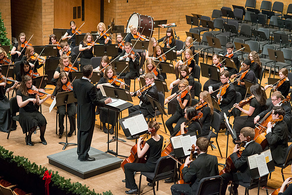 Students in the University Orchestra  during a dress rehearsal in preperation before their end of the semester concert.