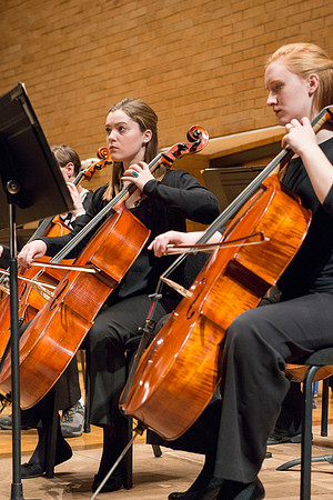 Students in the University Orchestra  during a dress rehearsal in preperation before their end of the semester concert.