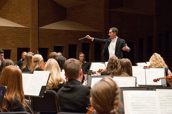 Students in the University Orchestra  during a dress rehearsal in preperation before their end of the semester concert.