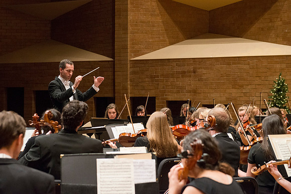 Students in the University Orchestra  during a dress rehearsal in preperation before their end of the semester concert.
