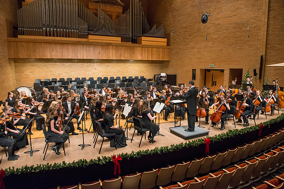 Students in the University Orchestra  during a dress rehearsal in preperation before their end of the semester concert.