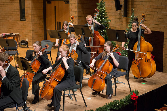 Students in the University Orchestra  during a dress rehearsal in preperation before their end of the semester concert.