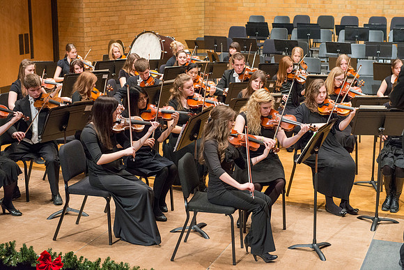 Students in the University Orchestra  during a dress rehearsal in preperation before their end of the semester concert.