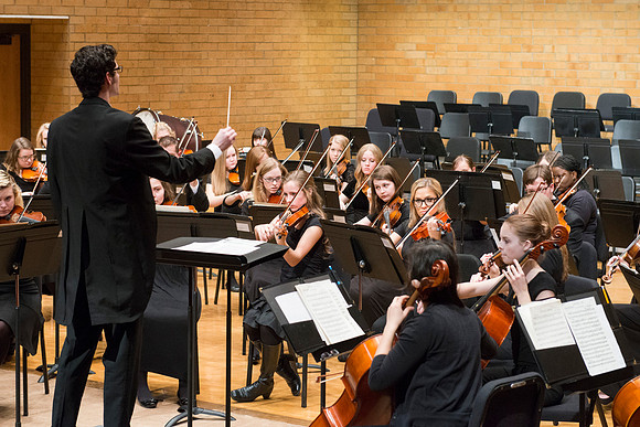 Students in the University Orchestra  during a dress rehearsal in preperation before their end of the semester concert.