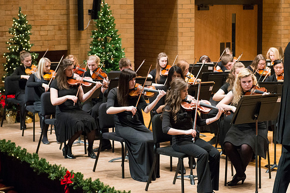 Students in the University Orchestra  during a dress rehearsal in preperation before their end of the semester concert.