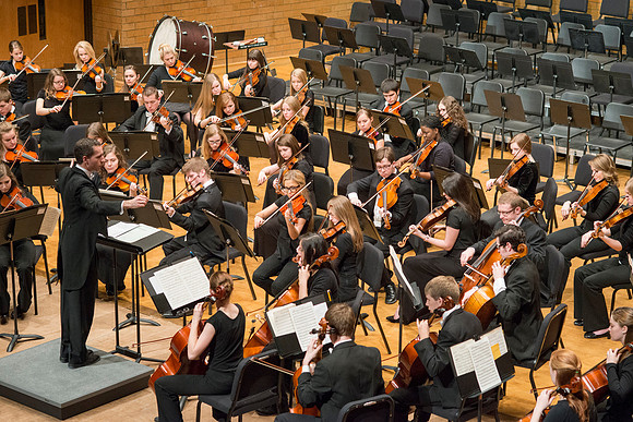 Students in the University Orchestra  during a dress rehearsal in preperation before their end of the semester concert.