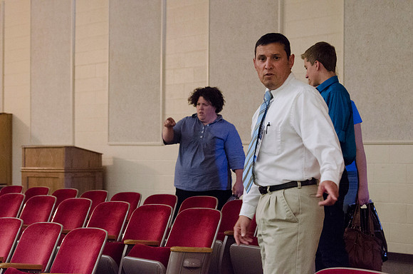 Participants count the seats in the Kirkham Auditorium.