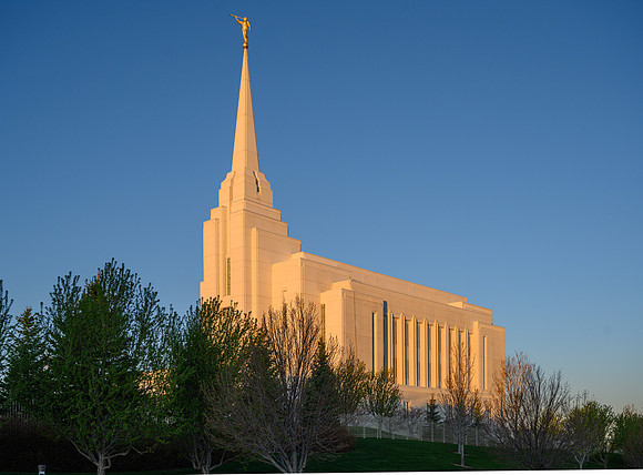 Sunrise lights up the Rexburg temple.