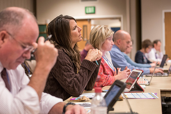 Faculty members come together in preparation of the new school year.