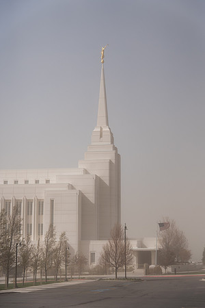 Rexburg Idaho Temple surrounded by dust during a wind storm.