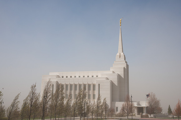 Rexburg Idaho Temple surrounded by dust during a wind storm.