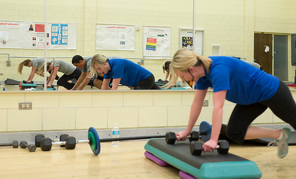 Students exercise in the Power Shred fitness class sponsored by the Wellness Center.