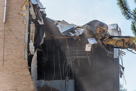 Big D Construction doing some major Destruction to the Kirkham Building.