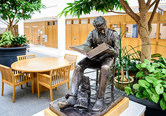 "Leaning Into the Light" by Stan Watts. Donated by Howard E. & Deloris K. Wall. Sculpture on display in the Kimball Building.
