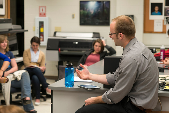 Back to Shool April 2014. Adjunct faculty, Doug McKay with his class in the Romney Photo Lab.