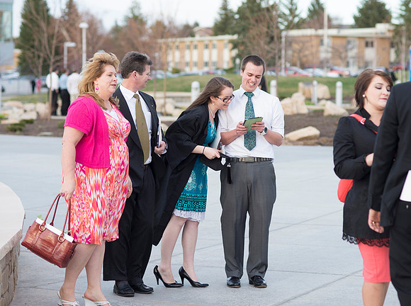 Graduates and family enjoy time between Commencement and Convocation.