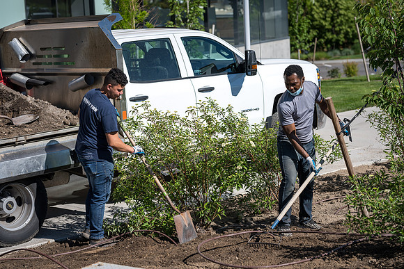 Cleaning up the grounds around the STC.