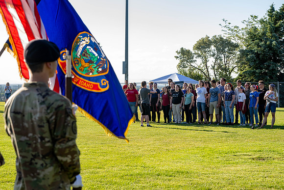 Students gather at the upper field for various 4th of July activities.
