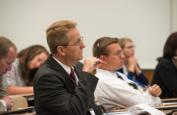 Faculty gather in the Hinckley Building for a conference to learn from their peers.