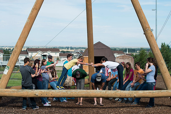 Youth high enjoy the Ropes Course class.