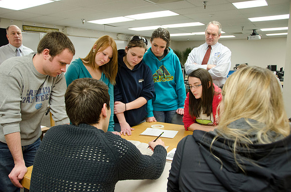 College horticulture class works with high school students to redesign the Clark playground facilities.