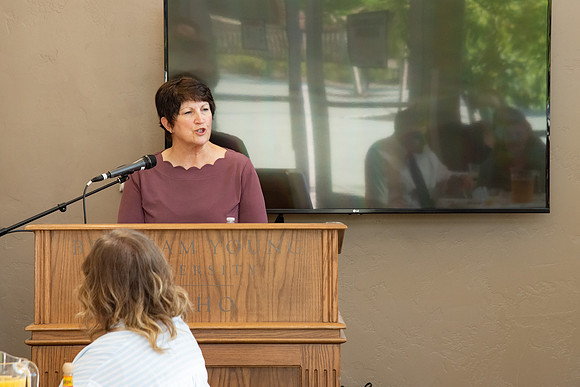 Faculty and Staff of Housing and Student Living gather for an early morning breakfast and an inspirational speaker.