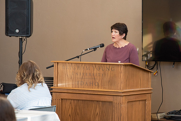 Faculty and Staff of Housing and Student Living gather for an early morning breakfast and an inspirational speaker.