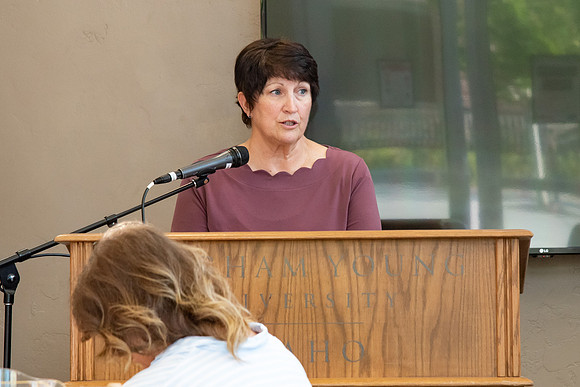 Faculty and Staff of Housing and Student Living gather for an early morning breakfast and an inspirational speaker.