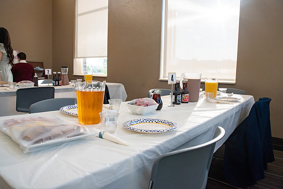 Faculty and Staff of Housing and Student Living gather for an early morning breakfast and an inspirational speaker.